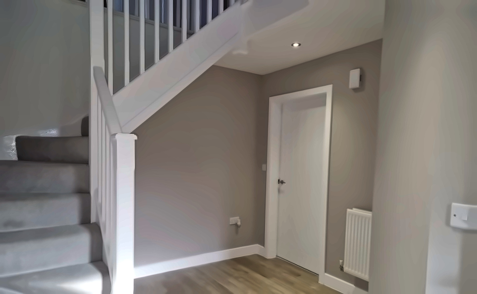 Alternate view of a finished plastered and painted hallway in Upper Norwood SE19.